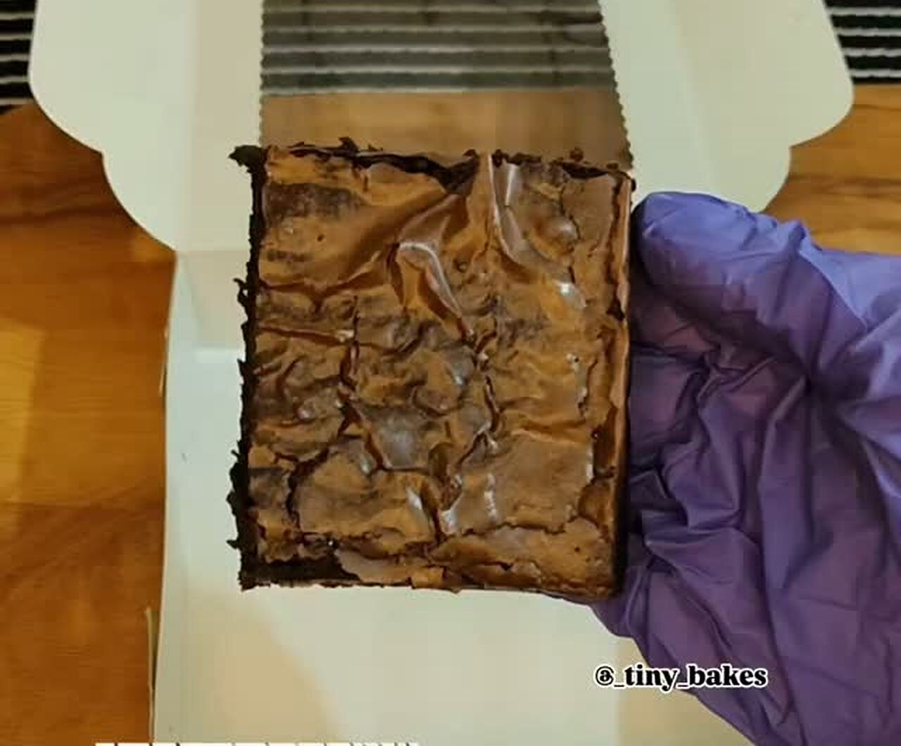Classic fudgy brownie with a crackly top, fresh from the box